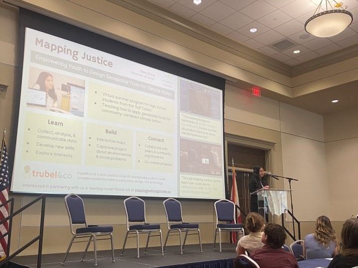 Presentation about Mapping Justice on stage at the Gulf Scholars Conference